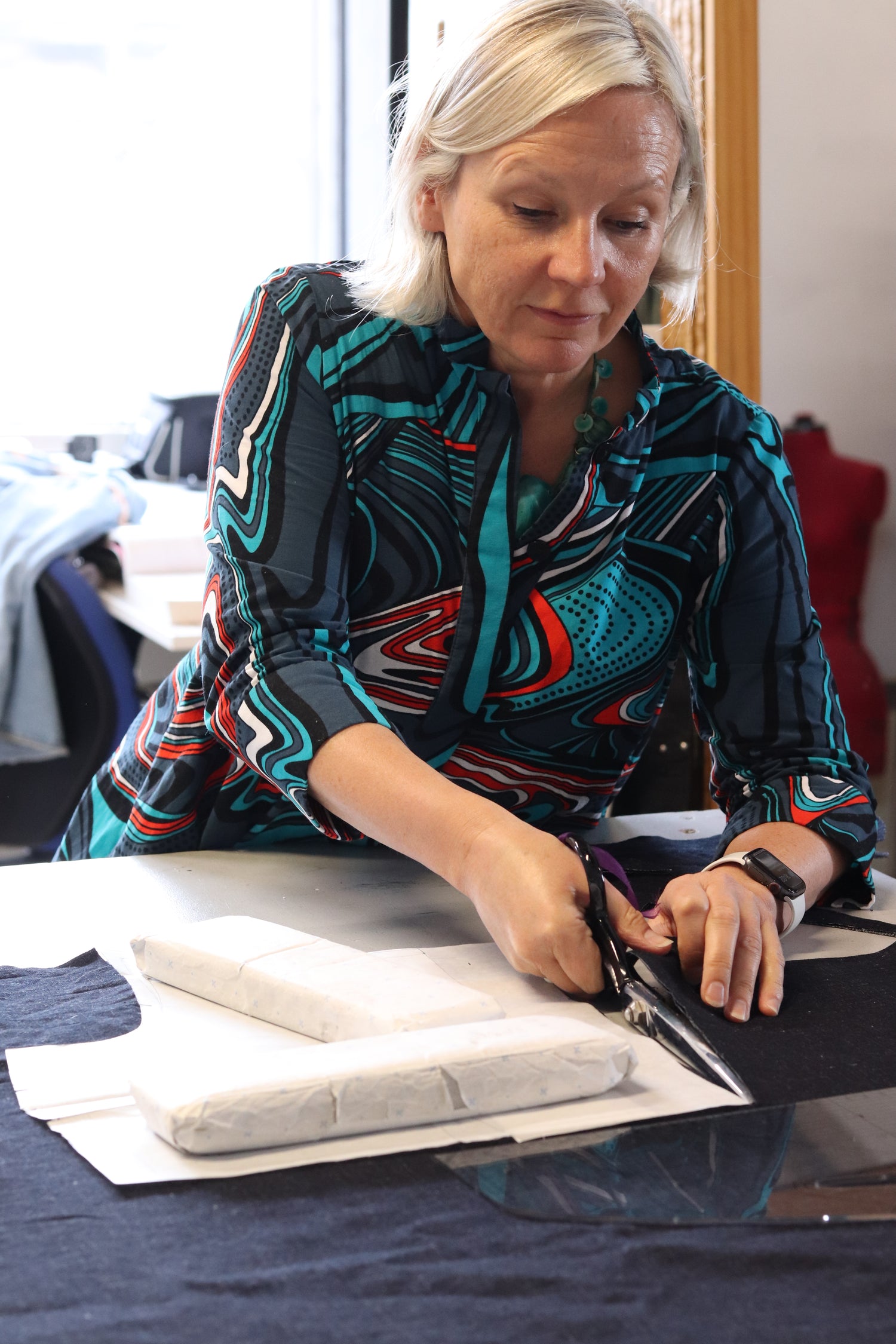 a student learning  to draft their own patterns during a one to one lesson at jen byrnes fashion studio in edinburgh city centre